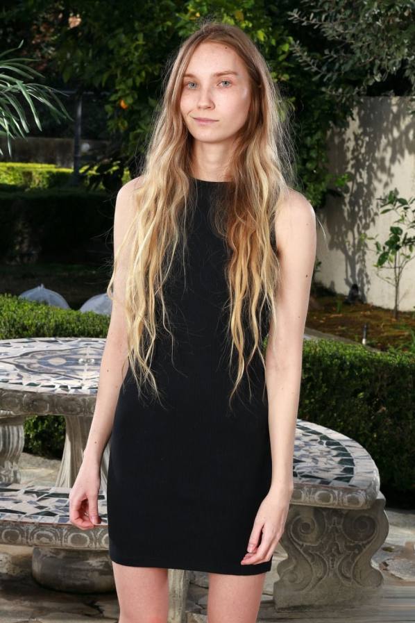 Claire Roos strips black dress, shows naked body