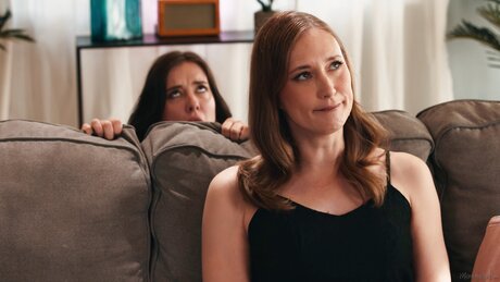 Stepmom eats brunette pussy on sofa