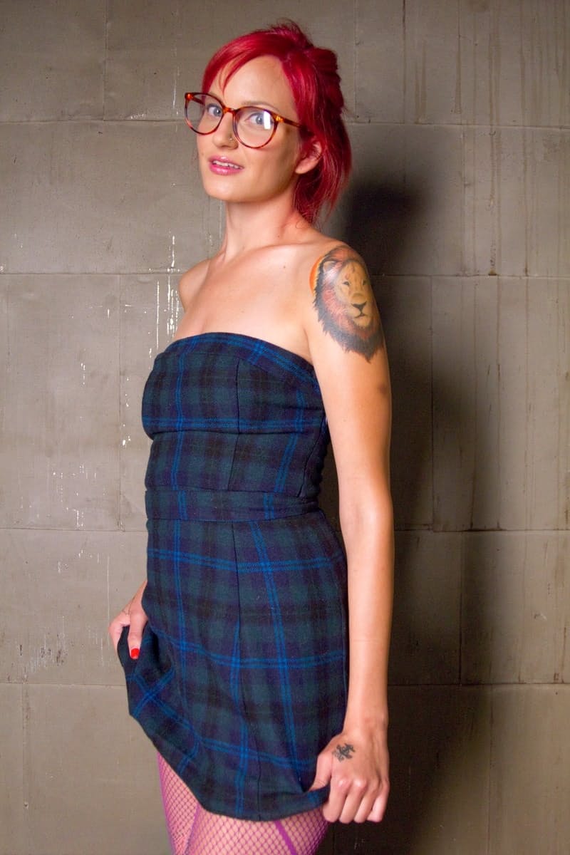 Phoenix Askani burns bright stripping fishnet to bare squat