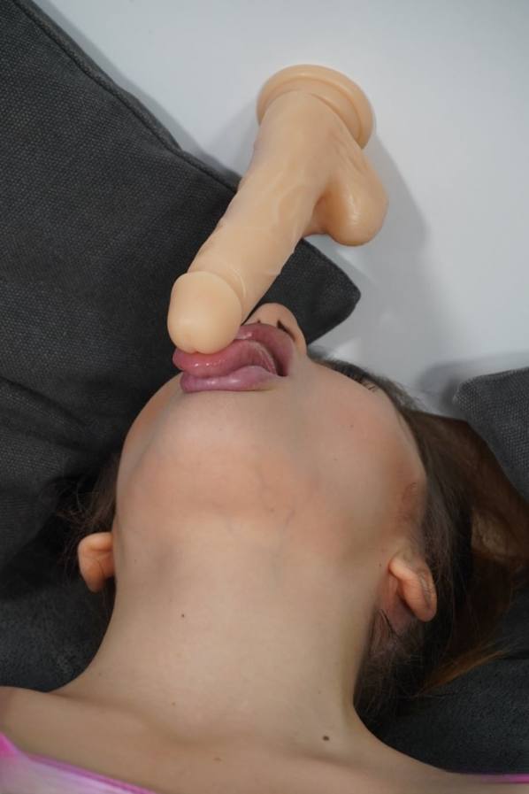 Rita Fox takes wall dildo in mouth and pussy