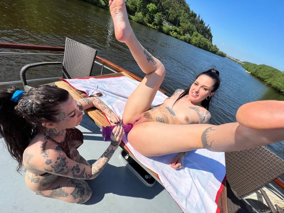 Sex on a boat after tattooed girls flash tits