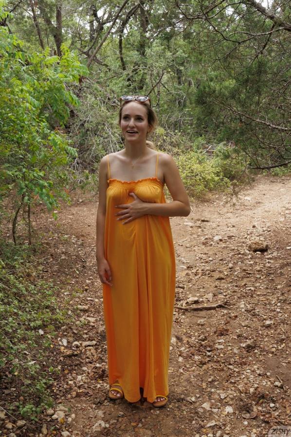 Athena Fleurs bares natural tits, fucking outdoors