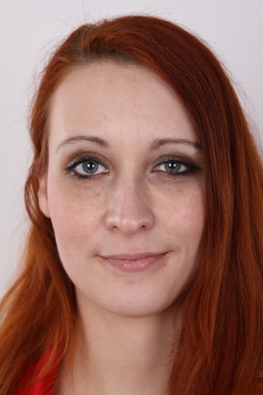 Redhead amateur strips bare, pussy on display
