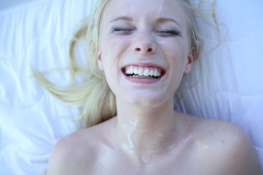 Porn Photo - Blonde gets facial after kinky BDSM fuck