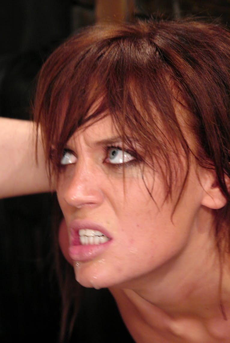 Tied Holly Wellin jerks a massive cock