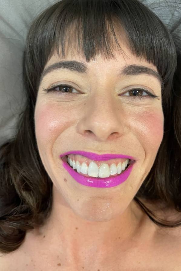 Vera King's dyed lips frame her wet pussy
