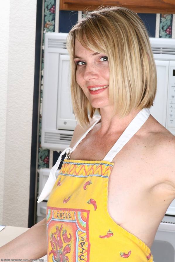 Naked blonde Brittany licks chocolate off her tits