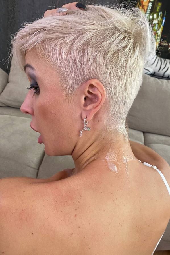 Pierced cunt shown, Tanya Virago grips a hard cock
