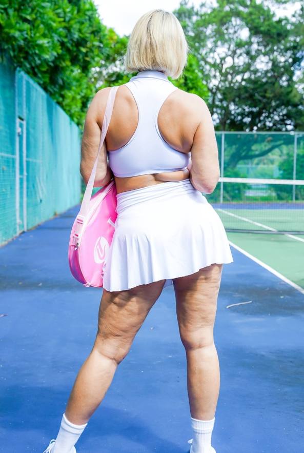 Big-assed tennis MILF Mellanie Monroe bares her tits and