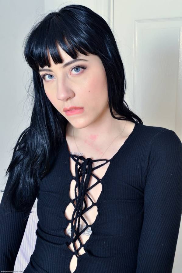 Charlotte Sartre shows off her tats, pink pussy, and tight