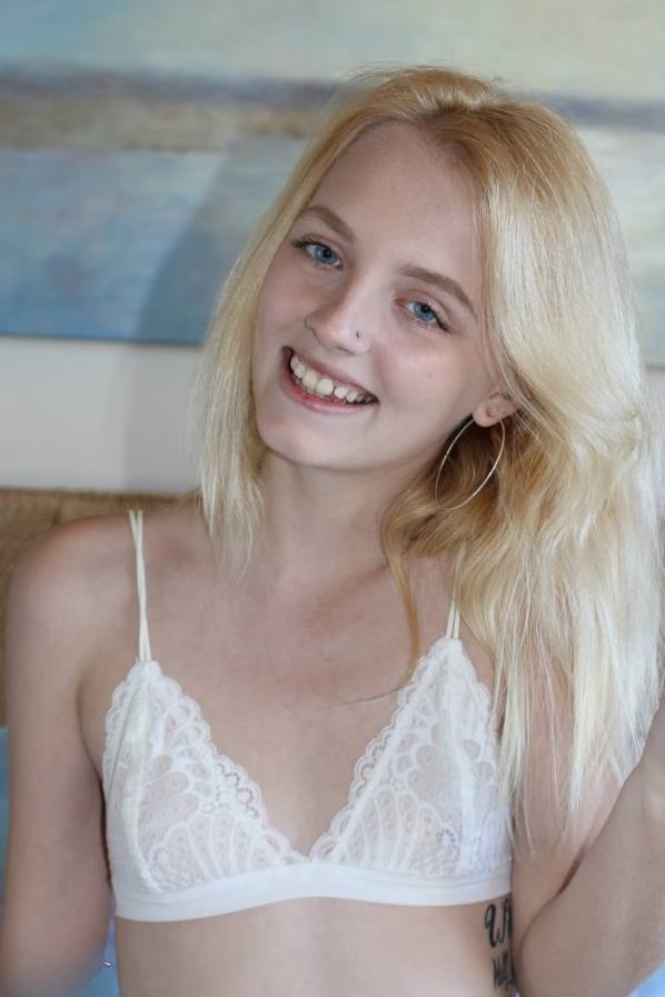 Naked Kate Bloom spreads her wet pussy on bed