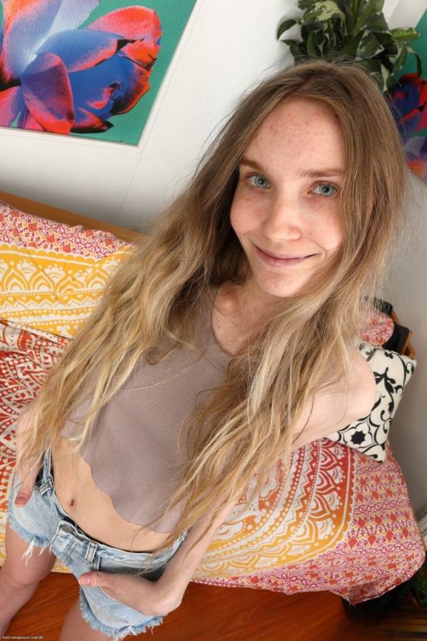 Horny Claire Roos strips bare showing wet holes