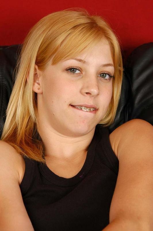 Leah strips fully, biting lip as nervous first fuck