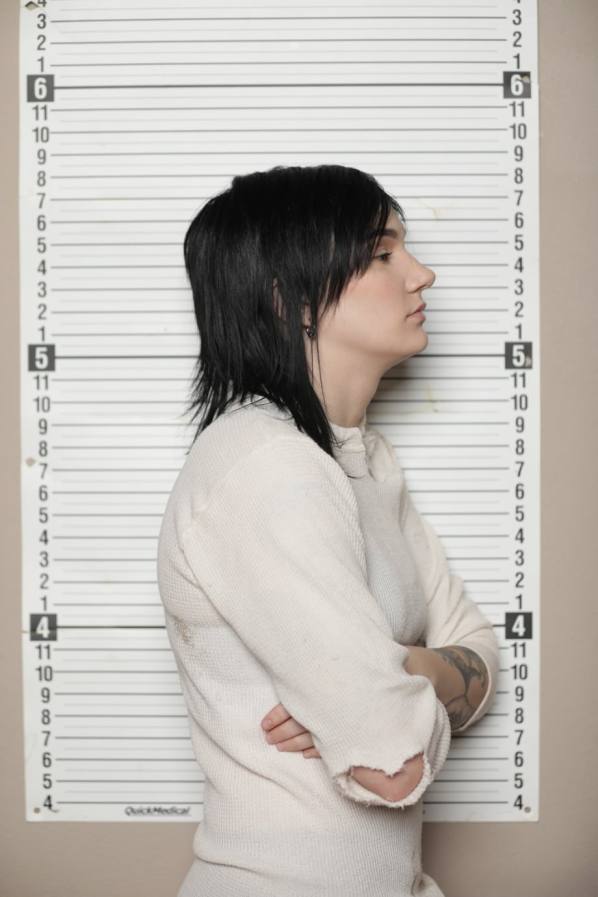 Behind bars, two dyke bad girls make out and get wet