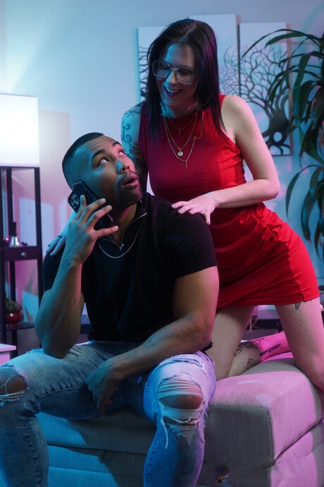 Red dress temptress Nikki Zee fucks a black cock