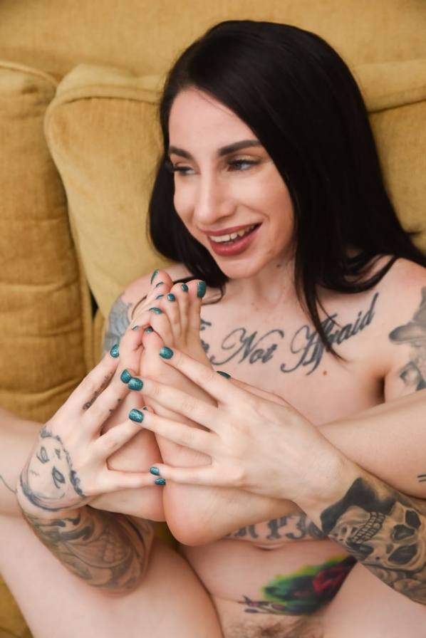 Inked Sheena Rose rubs her sexy feet, teases in lace