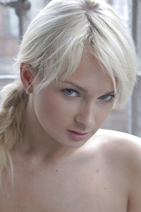 Ivana Sugar strips, showing off bare shaved pussy