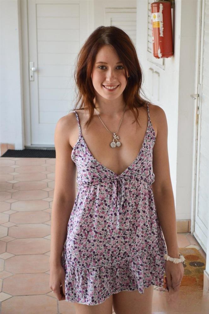 White stockings frame her spread pussy as dress lifts