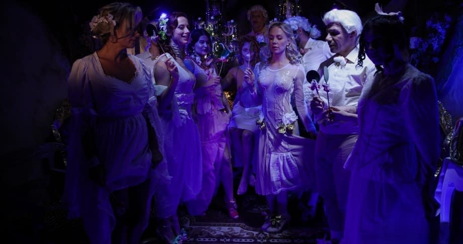 Costumed adults fuck in wild group orgy