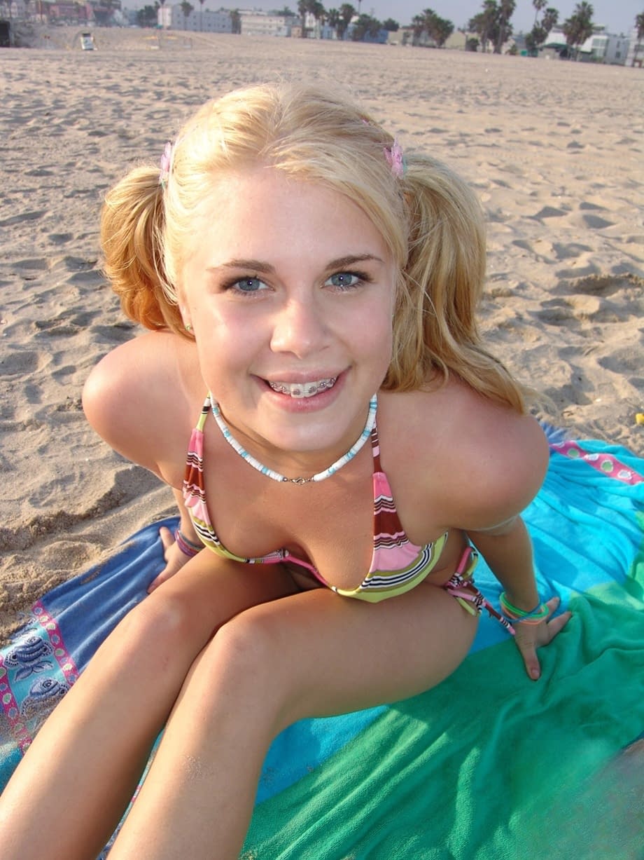 Slim pigtailed Summer bares tiny tits and huge ass