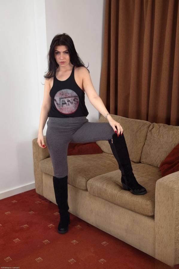 Lou Lou gets bare, hairy pussy spread wide on sofa