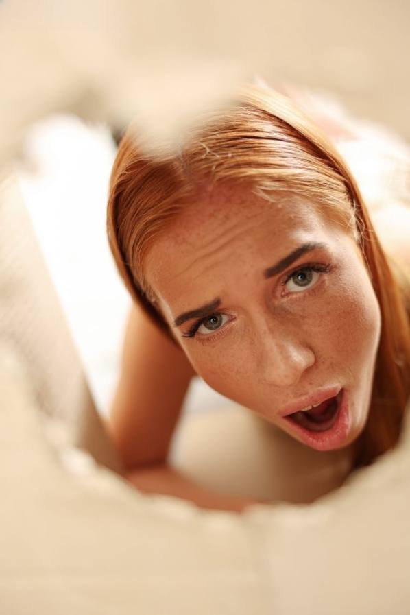 Fiery redhead fucks her man friend on sofa